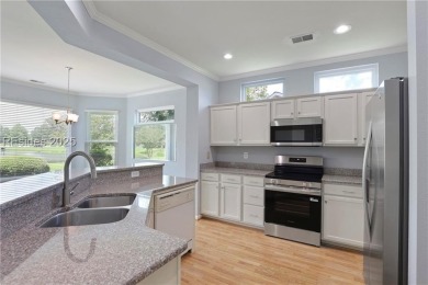 Impeccably maintained, this Hamilton Jefferson model offers on Okatie Creek Golf Club in South Carolina - for sale on GolfHomes.com, golf home, golf lot