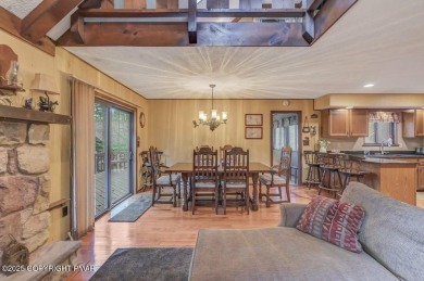Discover the perfect blend of comfort and charm in this on Lake Naomi Timber Trails Golf Club in Pennsylvania - for sale on GolfHomes.com, golf home, golf lot