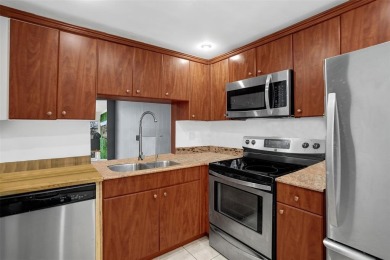 Beautifully updated 2nd-floor condo offering 1 bedroom, 1.5 on Pine Island Ridge Country Club in Florida - for sale on GolfHomes.com, golf home, golf lot