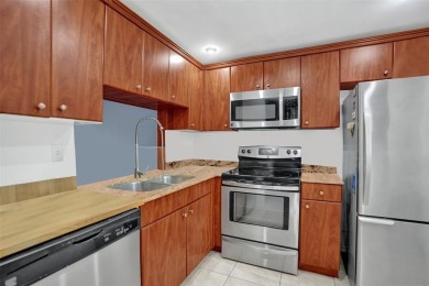 Beautifully updated 2nd-floor condo offering 1 bedroom, 1.5 on Pine Island Ridge Country Club in Florida - for sale on GolfHomes.com, golf home, golf lot