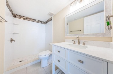 Great value in this beautifully renovated ground floor villa on Isla Del Sol Yacht and Country Club in Florida - for sale on GolfHomes.com, golf home, golf lot