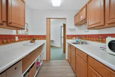 Welcome to this fantastic two-bedroom, one-bathroom condo on Centennial Oaks Golf Club in Iowa - for sale on GolfHomes.com, golf home, golf lot