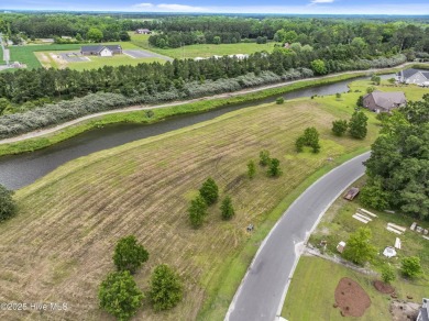 Discover the perfect opportunity to build your dream home on River Landing Golf Course in North Carolina - for sale on GolfHomes.com, golf home, golf lot