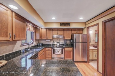 Discover the perfect blend of comfort and charm in this on Lake Naomi Timber Trails Golf Club in Pennsylvania - for sale on GolfHomes.com, golf home, golf lot