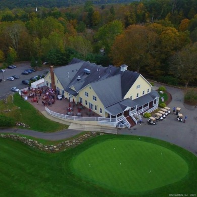 Discover the epitome of tranquility and seclusion with this on The Club at River Oaks in Connecticut - for sale on GolfHomes.com, golf home, golf lot