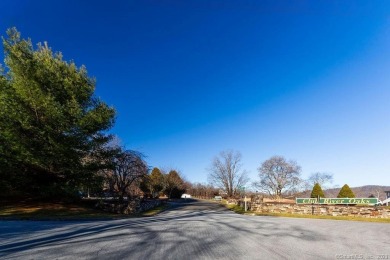 Discover the epitome of tranquility and seclusion with this on The Club at River Oaks in Connecticut - for sale on GolfHomes.com, golf home, golf lot