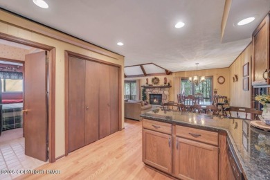 Discover the perfect blend of comfort and charm in this on Lake Naomi Timber Trails Golf Club in Pennsylvania - for sale on GolfHomes.com, golf home, golf lot