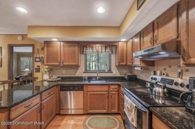 Discover the perfect blend of comfort and charm in this on Lake Naomi Timber Trails Golf Club in Pennsylvania - for sale on GolfHomes.com, golf home, golf lot