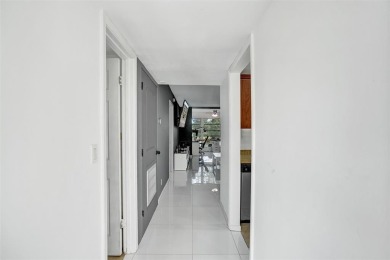 Beautifully updated 2nd-floor condo offering 1 bedroom, 1.5 on Pine Island Ridge Country Club in Florida - for sale on GolfHomes.com, golf home, golf lot