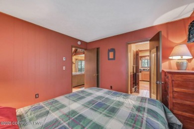 Discover the perfect blend of comfort and charm in this on Lake Naomi Timber Trails Golf Club in Pennsylvania - for sale on GolfHomes.com, golf home, golf lot