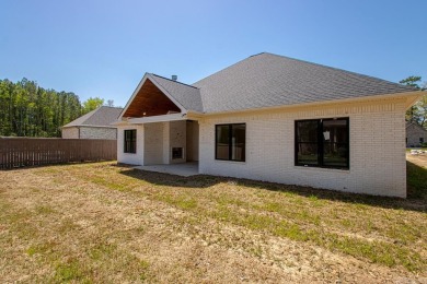 This inviting home is located a 219 Arlington Park Terrace in on Hot Springs Golf and Country Club in Arkansas - for sale on GolfHomes.com, golf home, golf lot