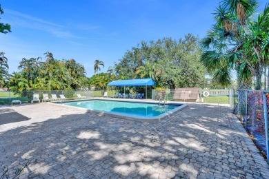Beautifully updated 2nd-floor condo offering 1 bedroom, 1.5 on Pine Island Ridge Country Club in Florida - for sale on GolfHomes.com, golf home, golf lot