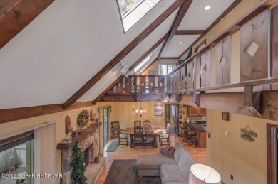 Discover the perfect blend of comfort and charm in this on Lake Naomi Timber Trails Golf Club in Pennsylvania - for sale on GolfHomes.com, golf home, golf lot