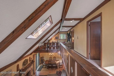Discover the perfect blend of comfort and charm in this on Lake Naomi Timber Trails Golf Club in Pennsylvania - for sale on GolfHomes.com, golf home, golf lot