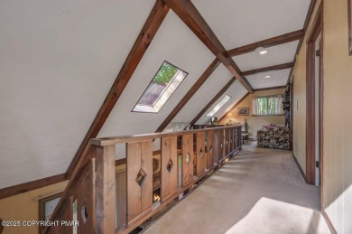 Discover the perfect blend of comfort and charm in this on Lake Naomi Timber Trails Golf Club in Pennsylvania - for sale on GolfHomes.com, golf home, golf lot