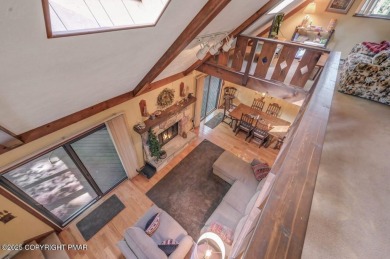 Discover the perfect blend of comfort and charm in this on Lake Naomi Timber Trails Golf Club in Pennsylvania - for sale on GolfHomes.com, golf home, golf lot