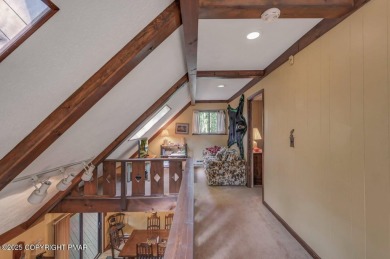 Discover the perfect blend of comfort and charm in this on Lake Naomi Timber Trails Golf Club in Pennsylvania - for sale on GolfHomes.com, golf home, golf lot
