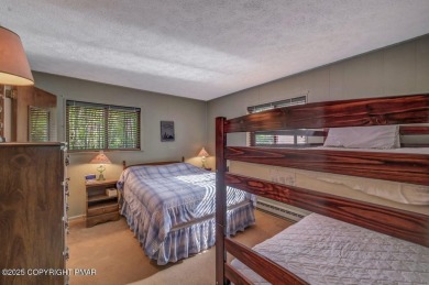 Discover the perfect blend of comfort and charm in this on Lake Naomi Timber Trails Golf Club in Pennsylvania - for sale on GolfHomes.com, golf home, golf lot