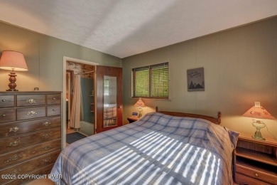 Discover the perfect blend of comfort and charm in this on Lake Naomi Timber Trails Golf Club in Pennsylvania - for sale on GolfHomes.com, golf home, golf lot