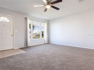 Quiet, serene living awaits in this charming 2-bedroom, 2-bath on Mainlands Golf Club in Florida - for sale on GolfHomes.com, golf home, golf lot