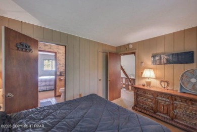 Discover the perfect blend of comfort and charm in this on Lake Naomi Timber Trails Golf Club in Pennsylvania - for sale on GolfHomes.com, golf home, golf lot