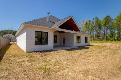 This inviting home is located a 219 Arlington Park Terrace in on Hot Springs Golf and Country Club in Arkansas - for sale on GolfHomes.com, golf home, golf lot