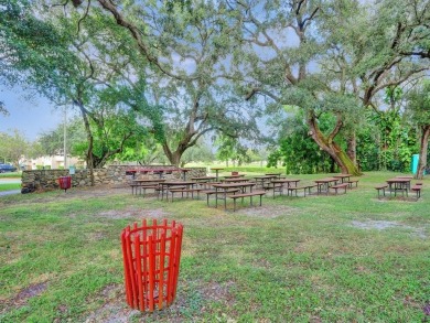 Beautifully updated 2nd-floor condo offering 1 bedroom, 1.5 on Pine Island Ridge Country Club in Florida - for sale on GolfHomes.com, golf home, golf lot