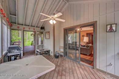 Discover the perfect blend of comfort and charm in this on Lake Naomi Timber Trails Golf Club in Pennsylvania - for sale on GolfHomes.com, golf home, golf lot