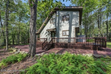 Discover the perfect blend of comfort and charm in this on Lake Naomi Timber Trails Golf Club in Pennsylvania - for sale on GolfHomes.com, golf home, golf lot