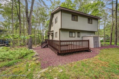 Discover the perfect blend of comfort and charm in this on Lake Naomi Timber Trails Golf Club in Pennsylvania - for sale on GolfHomes.com, golf home, golf lot