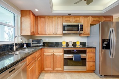 This beautifully updated second-floor unit showcases quality on Capri Isle Golf Club in Florida - for sale on GolfHomes.com, golf home, golf lot