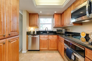 This beautifully updated second-floor unit showcases quality on Capri Isle Golf Club in Florida - for sale on GolfHomes.com, golf home, golf lot