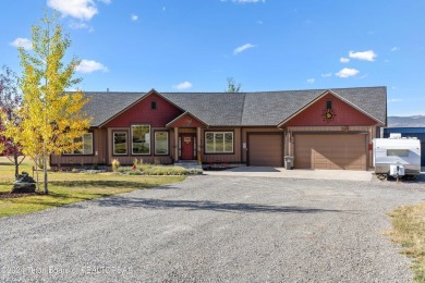 This exceptional 5-bedroom, 3-bath home, built by the renowned on Star Valley RV Golf Course in Wyoming - for sale on GolfHomes.com, golf home, golf lot