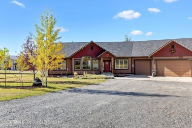 This exceptional 5-bedroom, 3-bath home, built by the renowned on Star Valley RV Golf Course in Wyoming - for sale on GolfHomes.com, golf home, golf lot