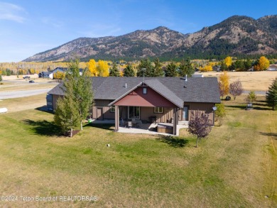 This exceptional 5-bedroom, 3-bath home, built by the renowned on Star Valley RV Golf Course in Wyoming - for sale on GolfHomes.com, golf home, golf lot