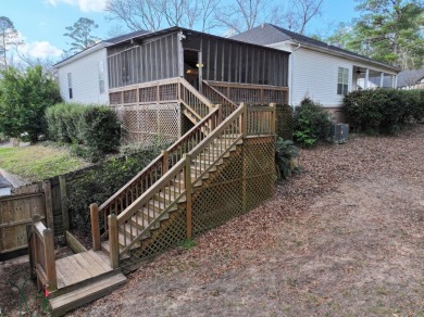 Discover this stunning 3-bedroom, 2.5-bathroom home nestled in on Jackson Links Golf Course in Alabama - for sale on GolfHomes.com, golf home, golf lot