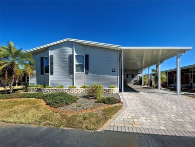 Welcome to easy Florida living in the desirable 55+ waterfront on Boca Royale Golf and Country Club in Florida - for sale on GolfHomes.com, golf home, golf lot