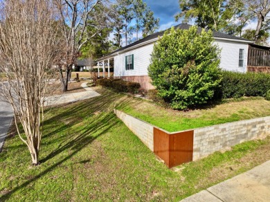 Discover this stunning 3-bedroom, 2.5-bathroom home nestled in on Jackson Links Golf Course in Alabama - for sale on GolfHomes.com, golf home, golf lot