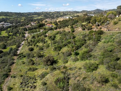 Set across 23.22 acres in the rolling hills of Fallbrook, CA on Pala Mesa Resort in California - for sale on GolfHomes.com, golf home, golf lot