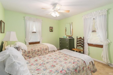 Welcome to the Happy Yellow House!  This 4 bedroom 2 1/2 half on Knollwood Country Club in Indiana - for sale on GolfHomes.com, golf home, golf lot