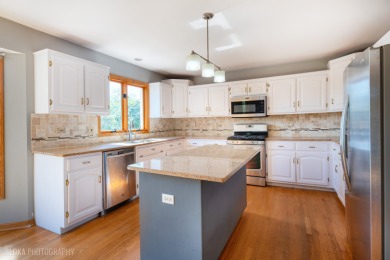 Over 5000 Sq Ft of Living Space Including Finished English on RedTail Golf Club in Illinois - for sale on GolfHomes.com, golf home, golf lot