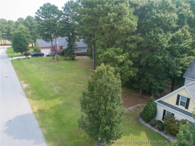 Beautiful lot with a water view located in the prestigious on Anderson Creek Golf Club in North Carolina - for sale on GolfHomes.com, golf home, golf lot