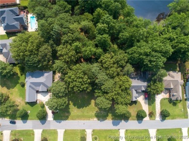 Beautiful lot with a water view located in the prestigious on Anderson Creek Golf Club in North Carolina - for sale on GolfHomes.com, golf home, golf lot