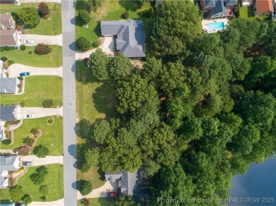 Beautiful lot with a water view located in the prestigious on Anderson Creek Golf Club in North Carolina - for sale on GolfHomes.com, golf home, golf lot