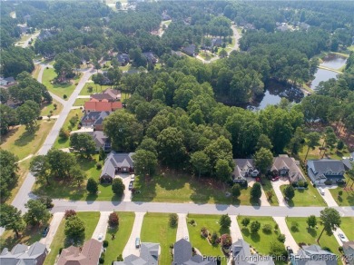 Beautiful lot with a water view located in the prestigious on Anderson Creek Golf Club in North Carolina - for sale on GolfHomes.com, golf home, golf lot