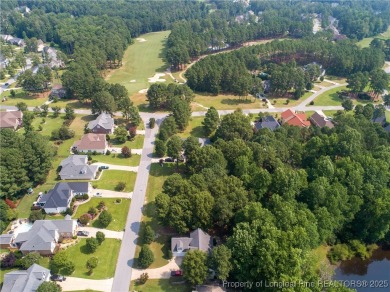 Beautiful lot with a water view located in the prestigious on Anderson Creek Golf Club in North Carolina - for sale on GolfHomes.com, golf home, golf lot