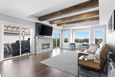 Welcome to 2764 W Crown Drive--a stunning 2022 ranch-style home on Crown Golf Course in Michigan - for sale on GolfHomes.com, golf home, golf lot