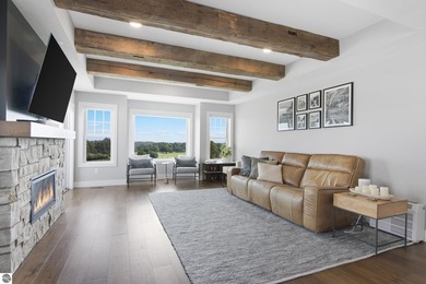 Welcome to 2764 W Crown Drive--a stunning 2022 ranch-style home on Crown Golf Course in Michigan - for sale on GolfHomes.com, golf home, golf lot