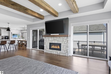 Welcome to 2764 W Crown Drive--a stunning 2022 ranch-style home on Crown Golf Course in Michigan - for sale on GolfHomes.com, golf home, golf lot