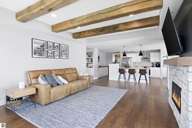 Welcome to 2764 W Crown Drive--a stunning 2022 ranch-style home on Crown Golf Course in Michigan - for sale on GolfHomes.com, golf home, golf lot